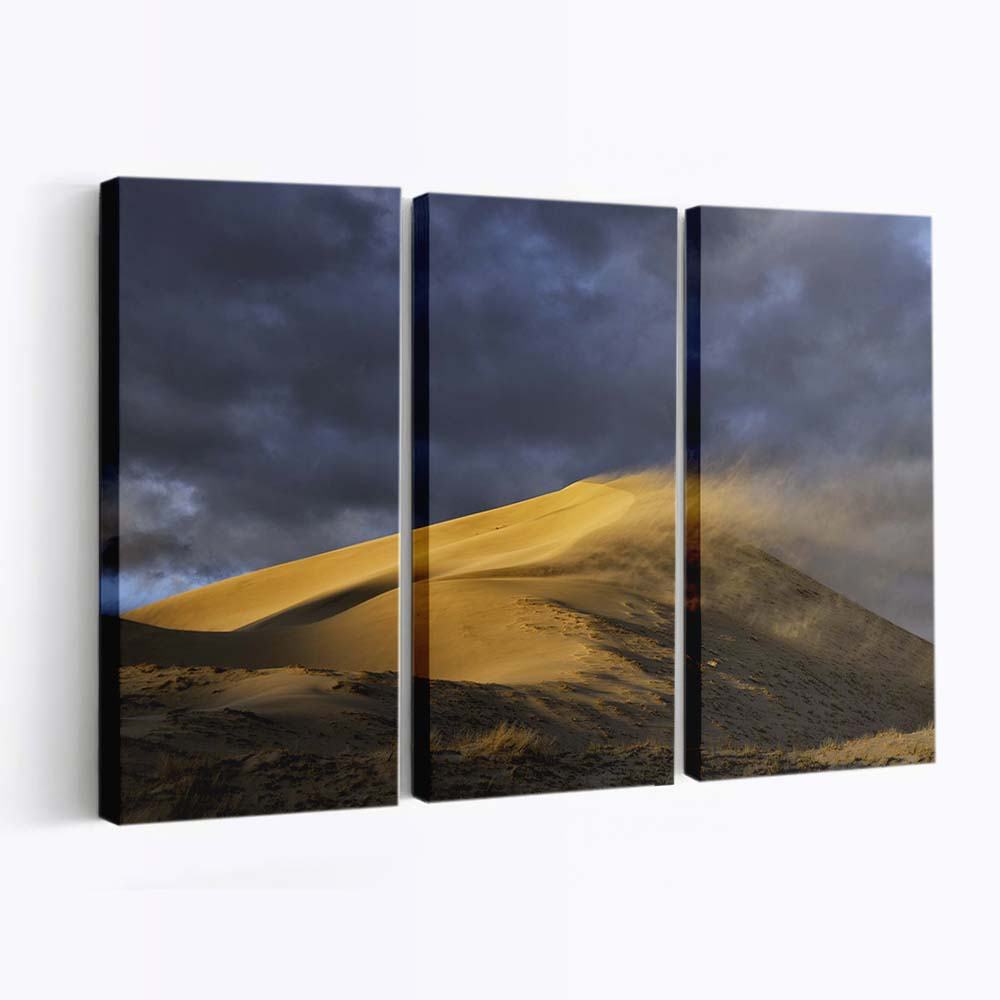 wind blowing sand from dune to dune desert wallpaper